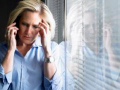 Woman listening on the telephone