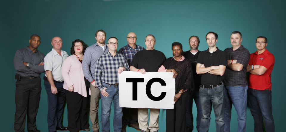 From left to right: Mike Tennant, Jean Cloutier, Bonnie Bates (research officer), Marc Blanchard, Patrice Robin, Harold Larson, Tom Hopkins, Sheri Parent, Milton Dyck, Seth Sazant (negotiator), Keith Parsons, Patrick St-Georges.