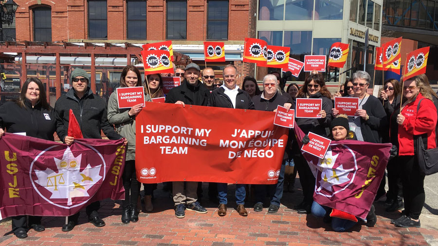 PSAC members rally at Liberal MP Wayne Long’s constituency office in Saint John, New Brunswick