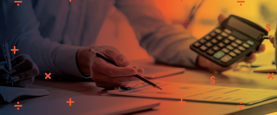 Phoenix graphic Paperwork on a desk with a person's hands holding a calculator.