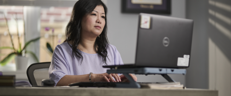 Photo of lady working on computer