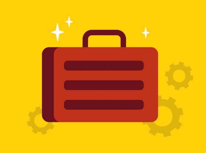 Image of brown briefcase on gear background