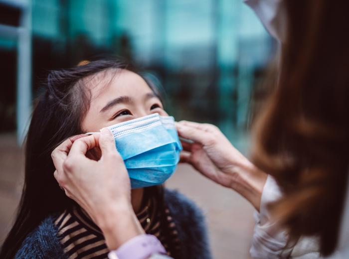 Girl wearing protective mask