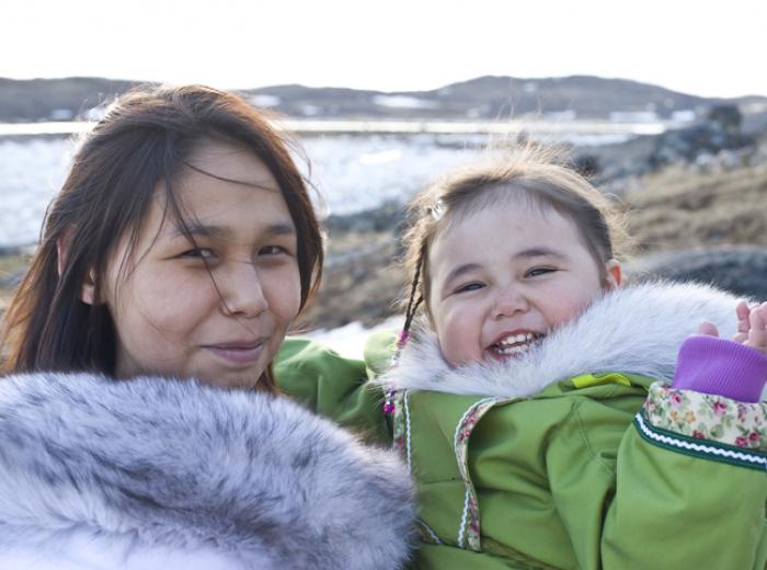 Inuit woman and child