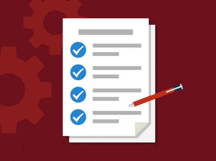 White paper with blue and white checkboxes on a dark red background