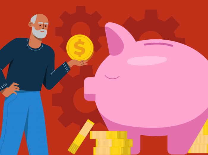 piggy bank with man holding coin