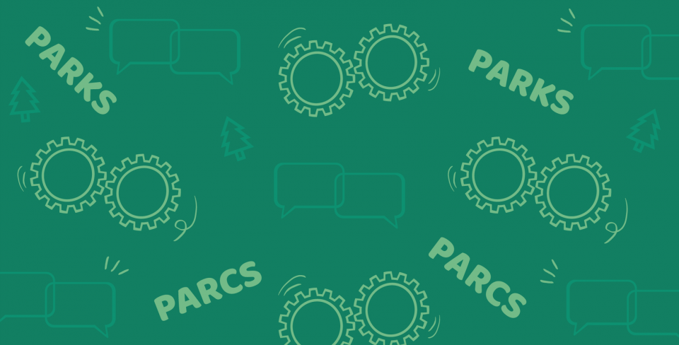 Green banner with the word "parks" and "parcs" written on it