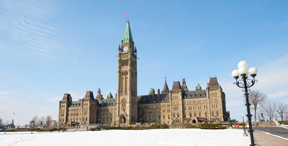 Photo of the Canadian Parliament buildings in winter