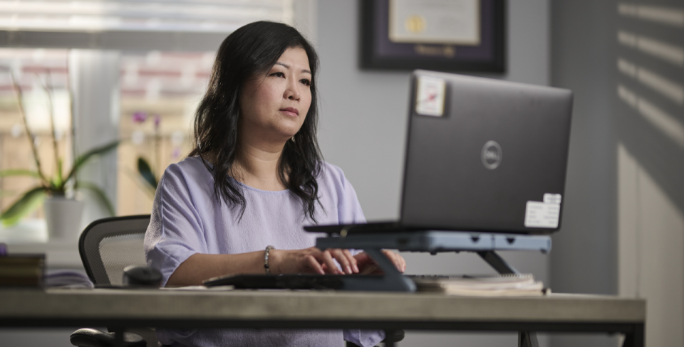 Photo of lady working on computer